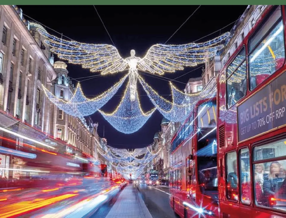 Regent Street angel lights spanning the street above London buses